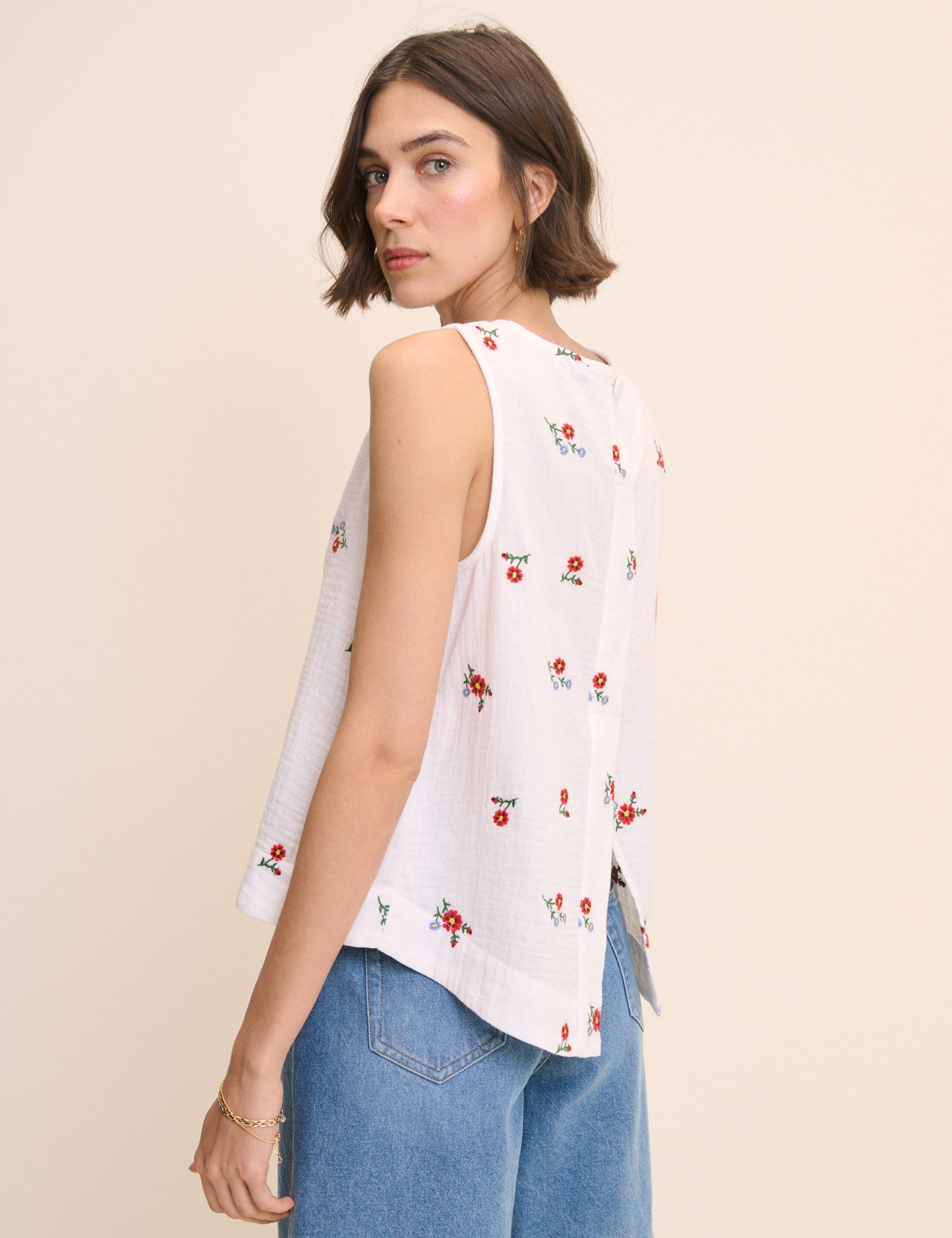 White Floral Embroidered Sleeveless Swing Top