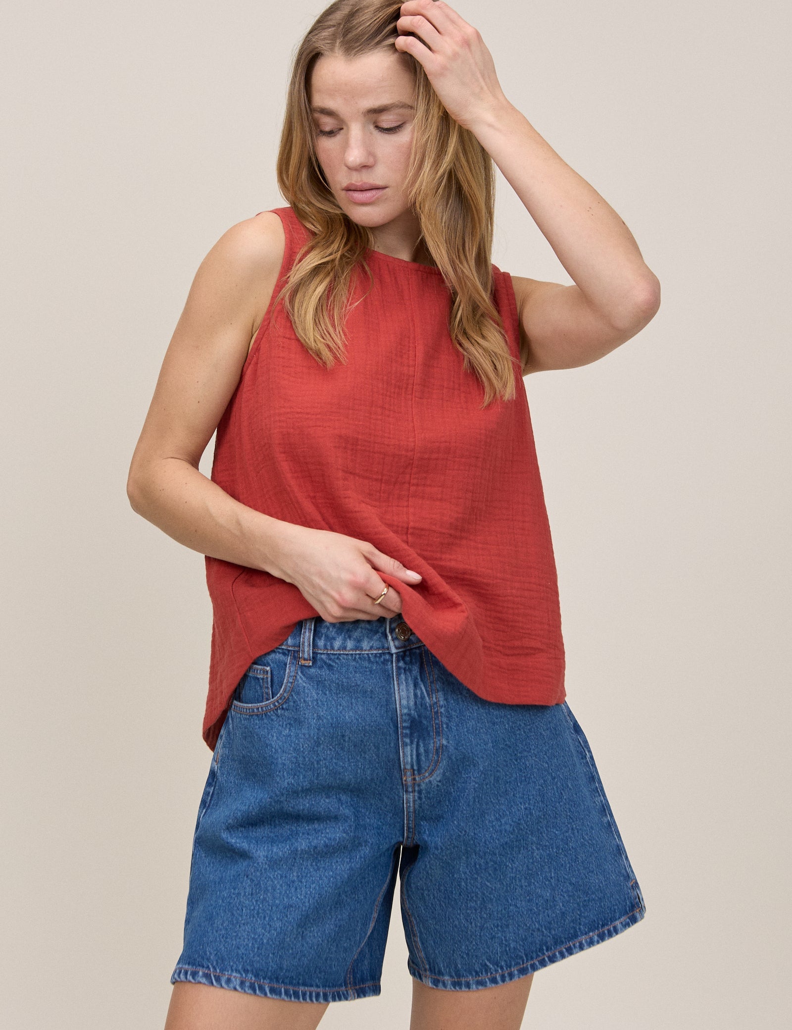 Red Sleeveless Swing Top